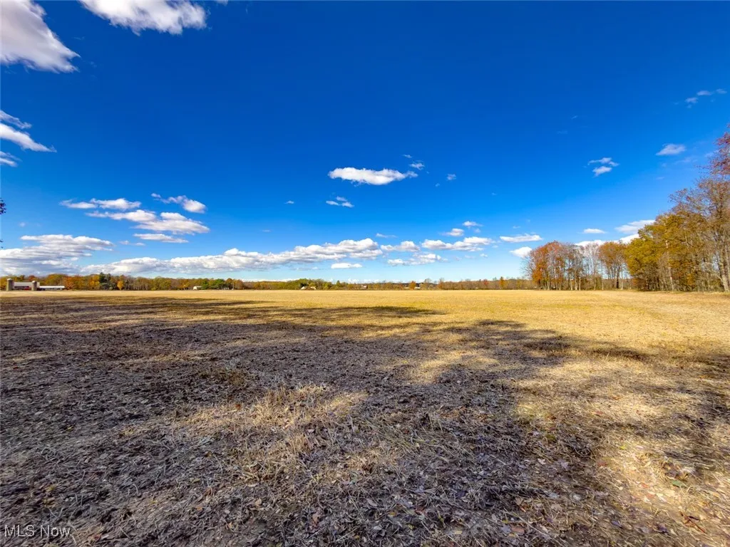 View of yard with a view of countryside