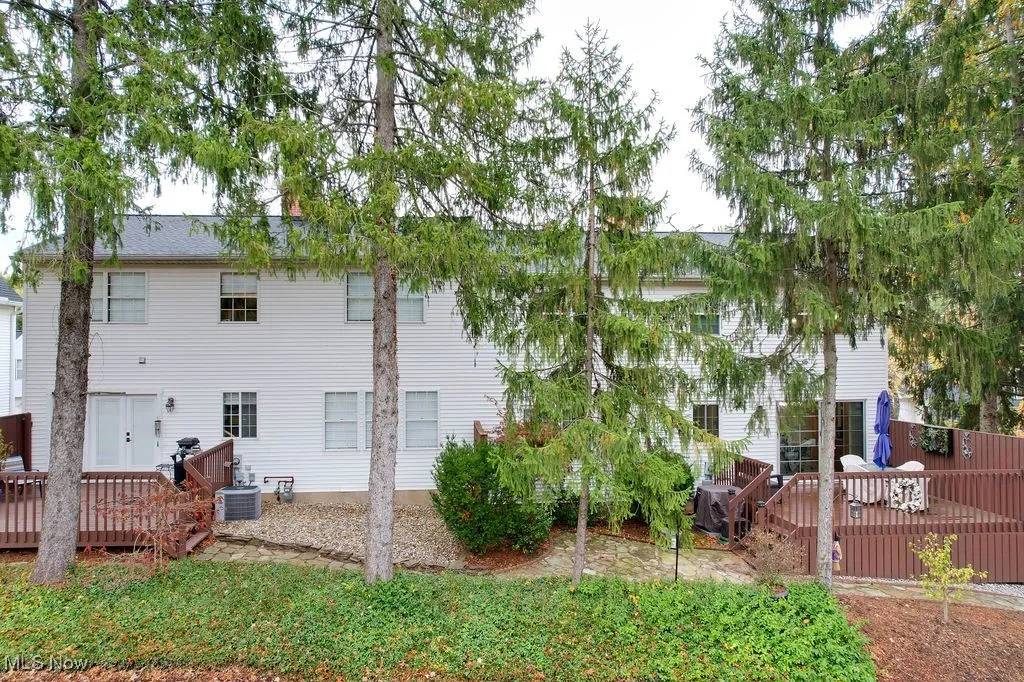 Back of property featuring a deck