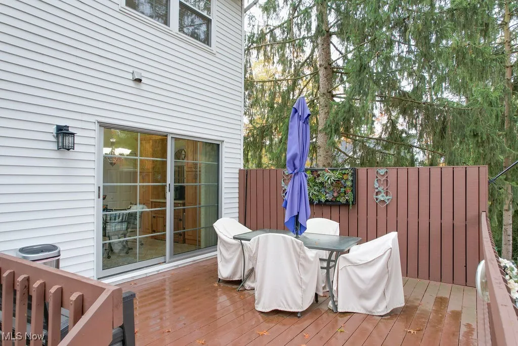Wooden terrace featuring outdoor dining space