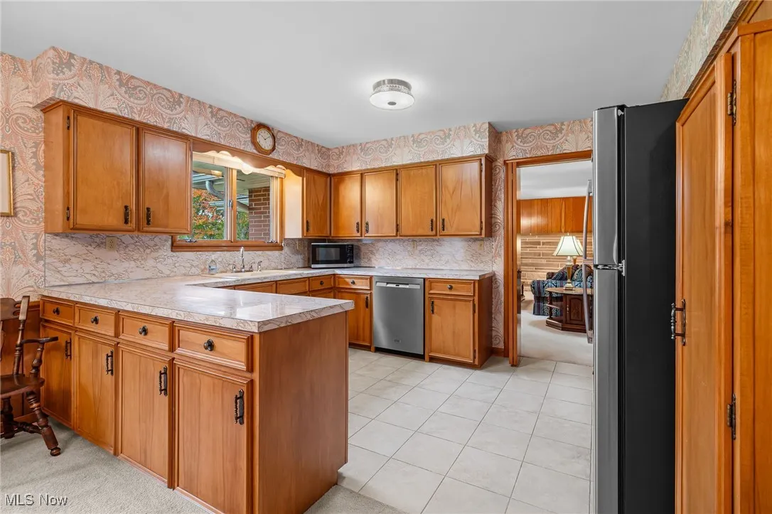 Stainless steel appliances, gas stove, dishwasher, refrigerator, wall oven and microwave