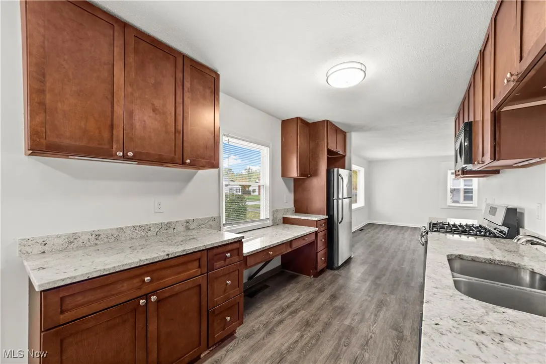 Fantastic Kitchen with Granite Counters, Maple Cabinets & Stainless Appliances