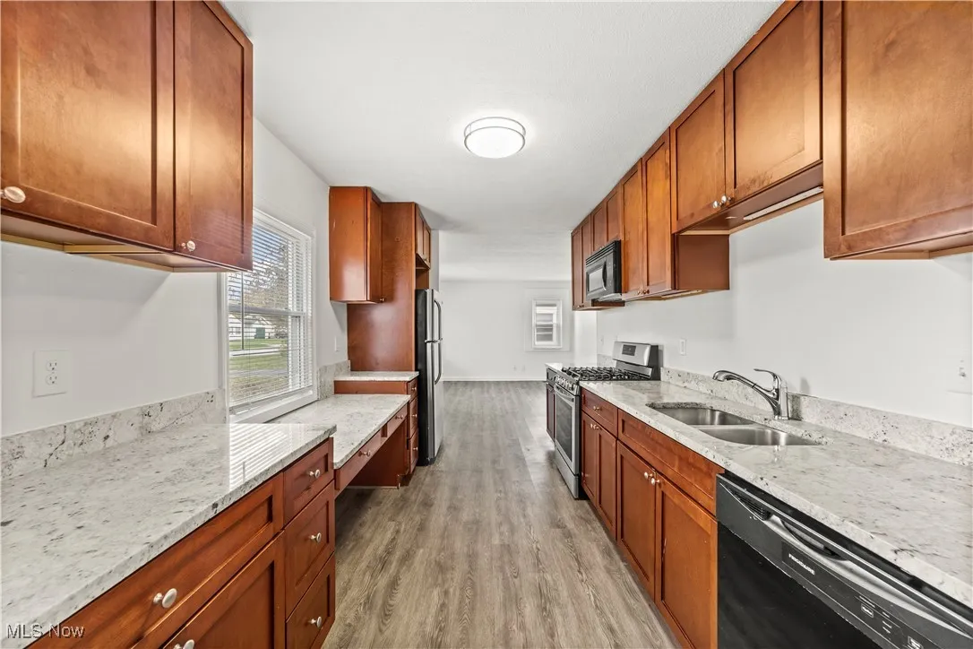 Fantastic Kitchen with Granite Counters, Maple Cabinets & Stainless Appliances