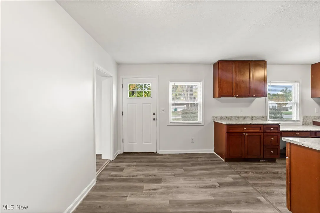 Eat-In Kitchen with Access to Large Fenced-In Backyard