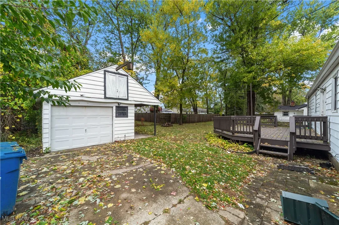 Backyard with deck and 1 car detached garage