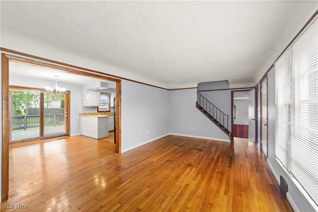 Living Room with Hardwood Floors and Neutrally Painted