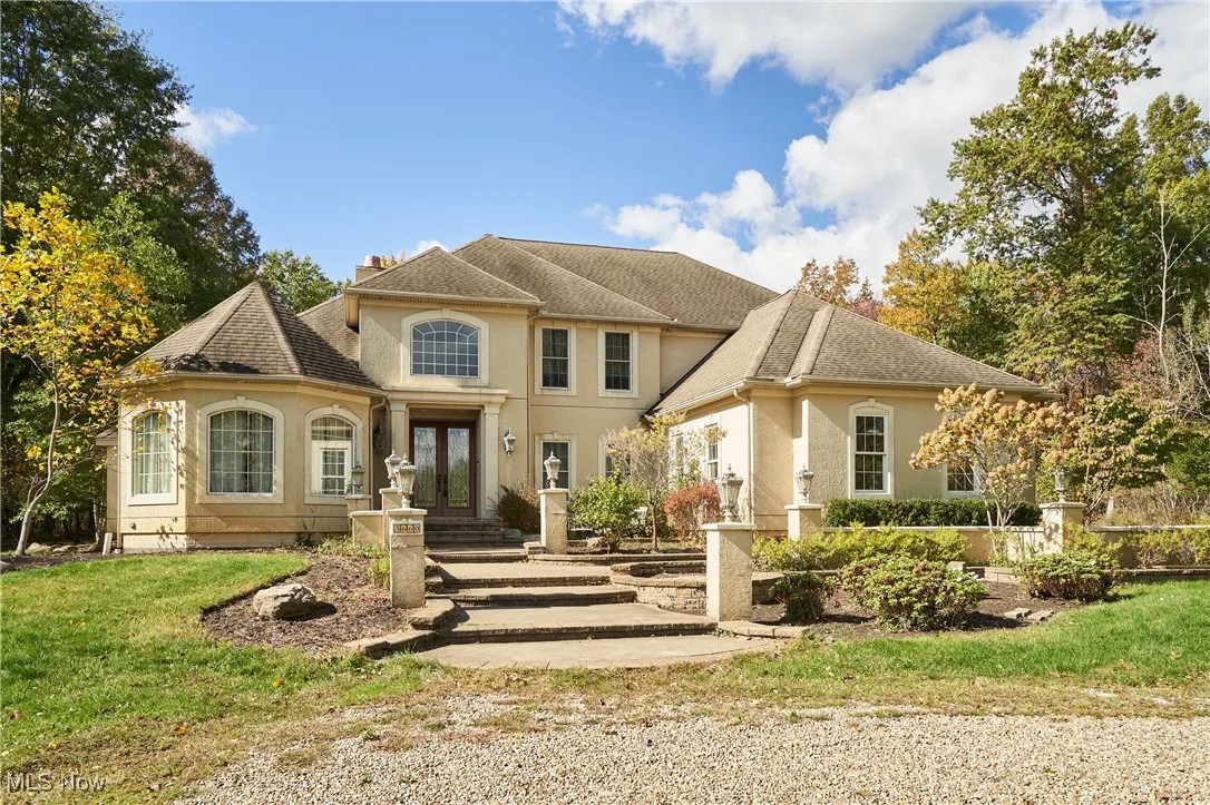 Welcome to 3660 Golf Course Dr. Norton OH . This custom built home sits on 4.5 acres of privacy!