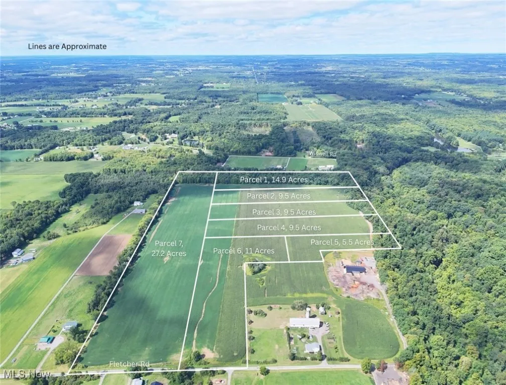 Aerial view of property's location featuring a forest and property boundaries highlighted