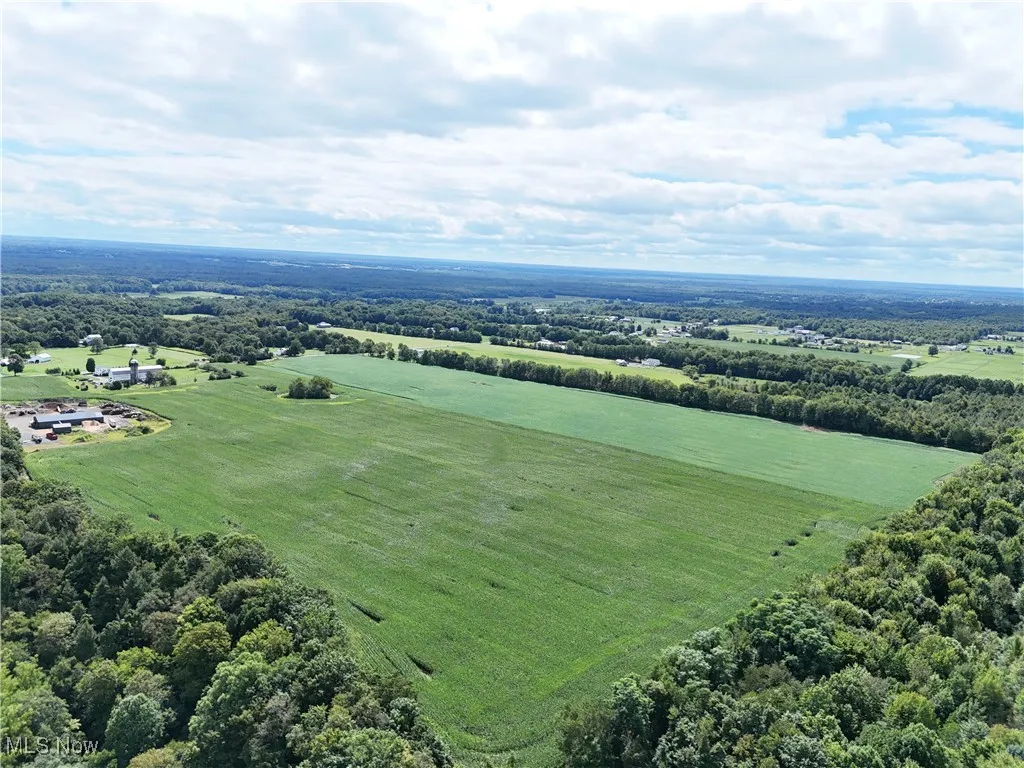 View of rural area featuring large plots for crops