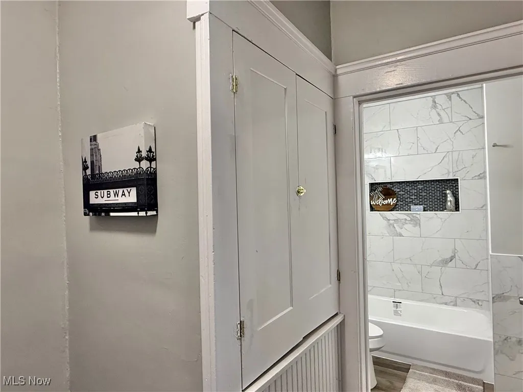 Built in Linen Closet and view of Newly Renovated full Bathroom ~