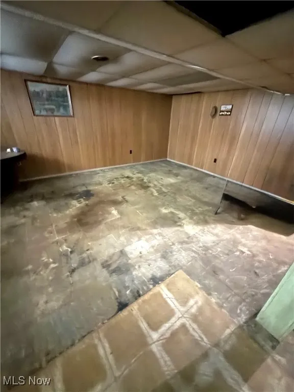 Finished below grade area with wooden walls