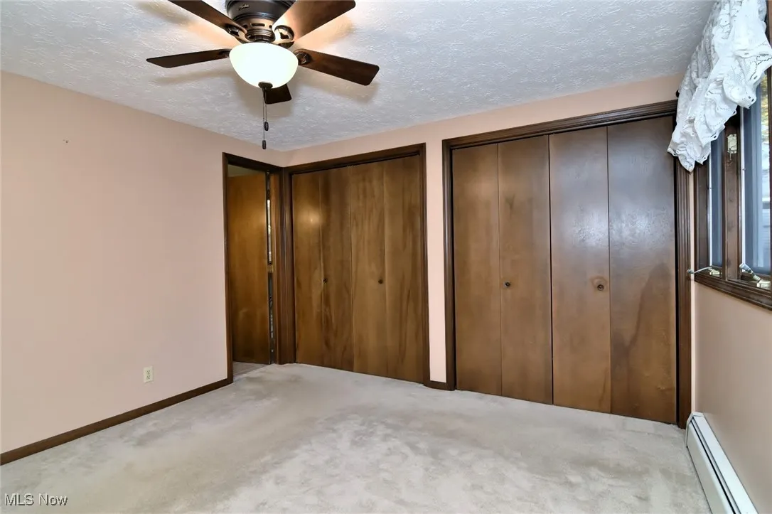 Primary Bedroom with his/hers closets.