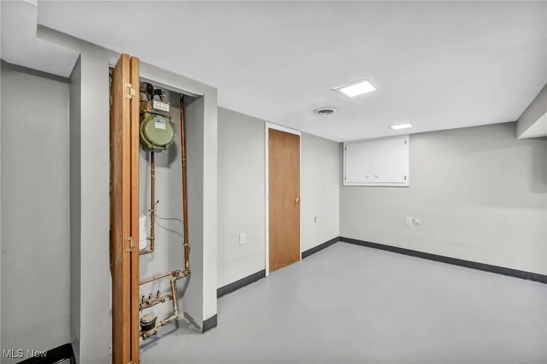 Finished basement with baseboards