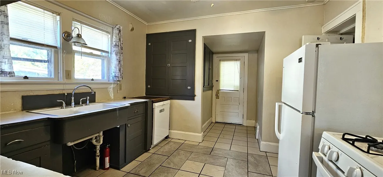 First floor bathroom view of a shower stall and toilet and sink