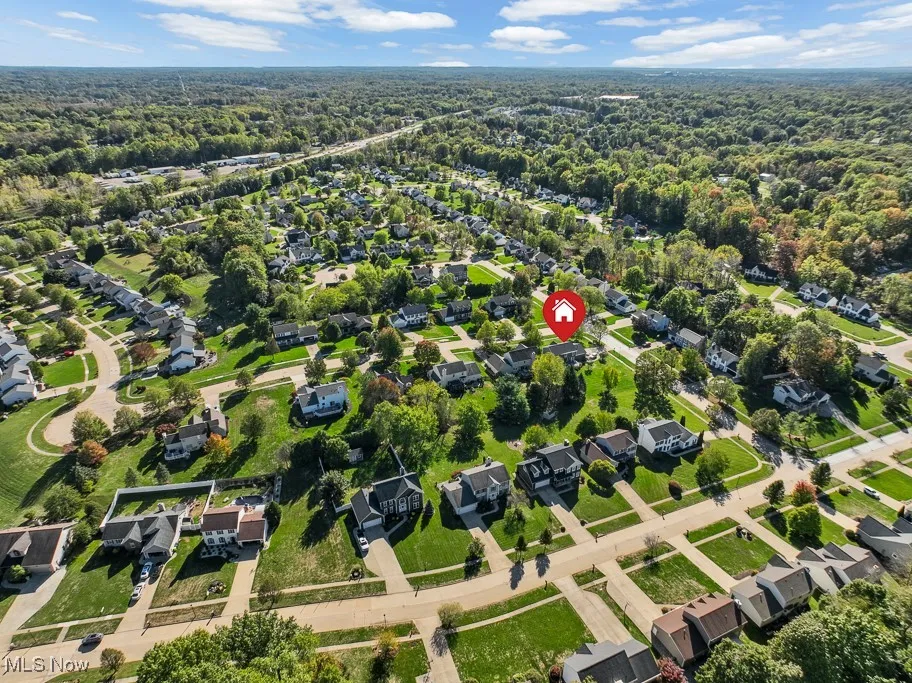 View of property location featuring nearby suburban area