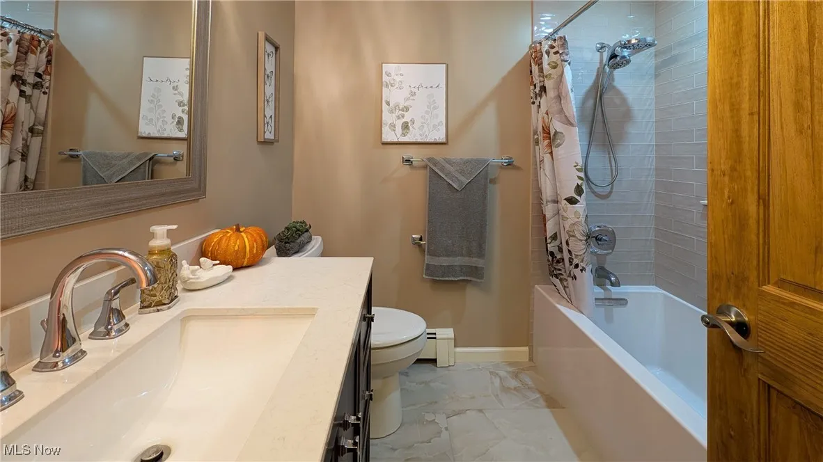 Beautifully remodeled hall bath with soaker tub