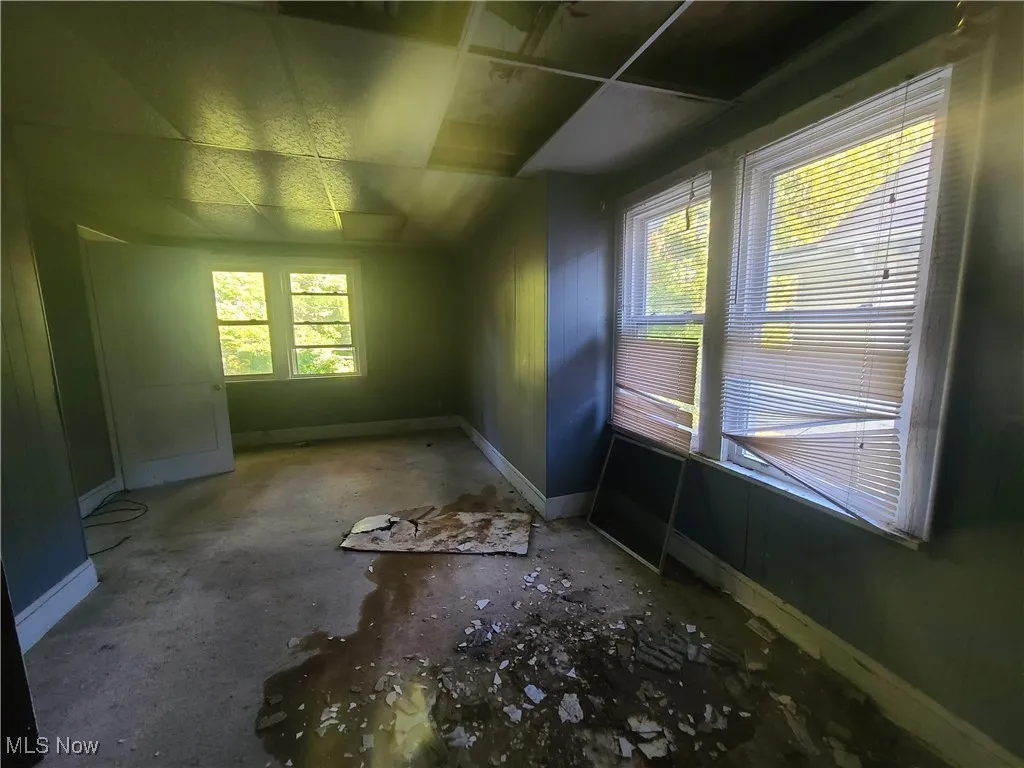 Spare room with baseboards