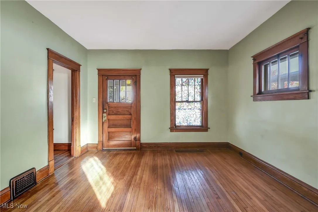 Living Room with original woodwork and flooring.