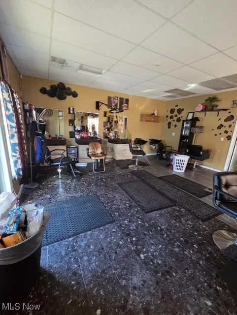 Exercise room featuring a paneled ceiling