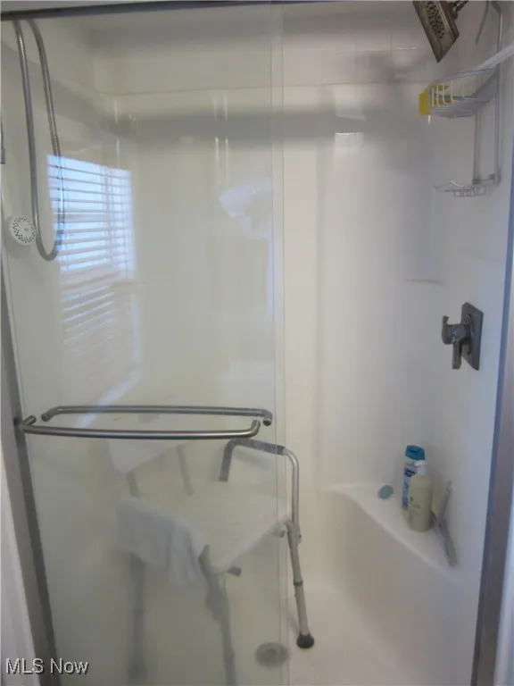 Bathroom with a stall shower