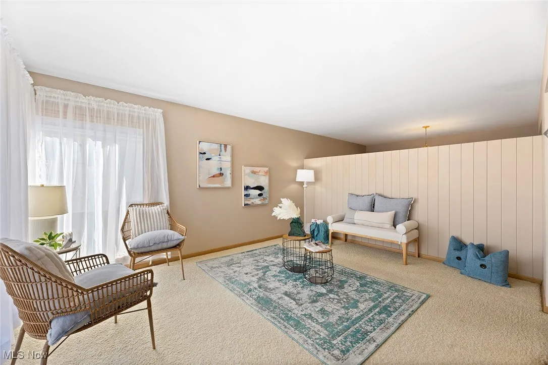 Living area featuring carpet