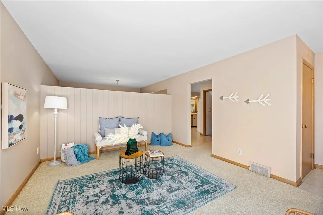 Sitting room with carpet floors