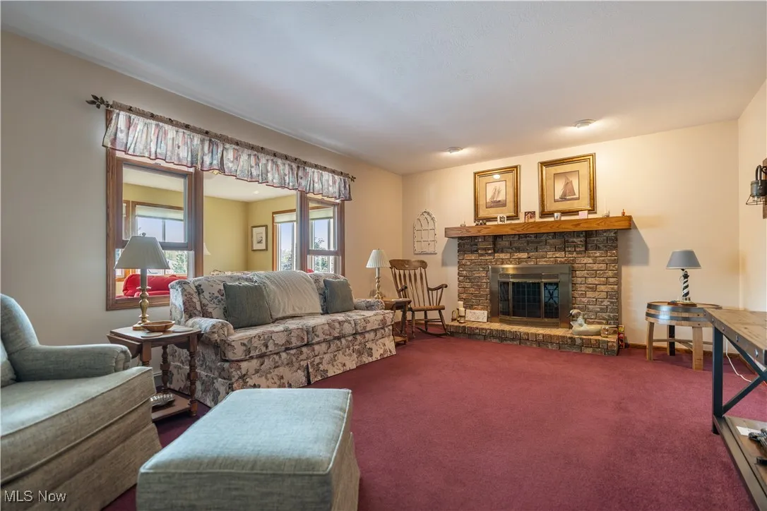 The family room has a feature fireplace wall.