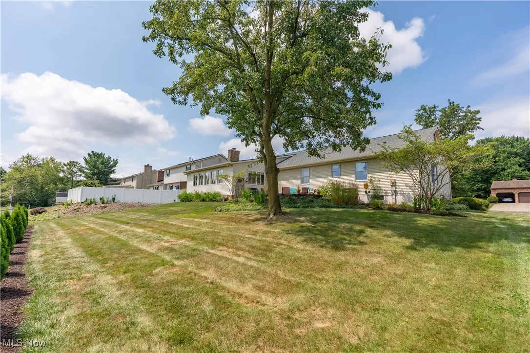 View of the yard and rear of the home.
