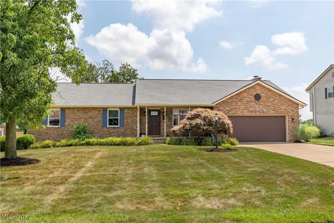 Welcome home to 6666 Carriage Lane Ave.