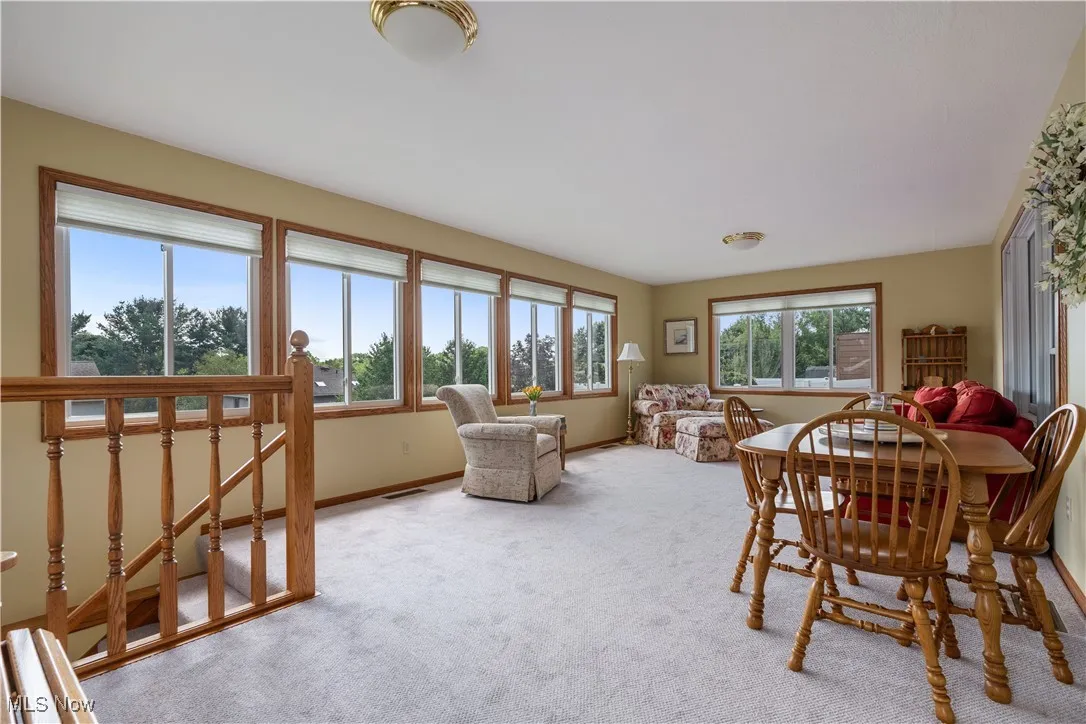 So much natural light in the sun/four season room.