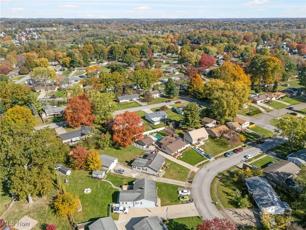 View of property location with nearby suburban area