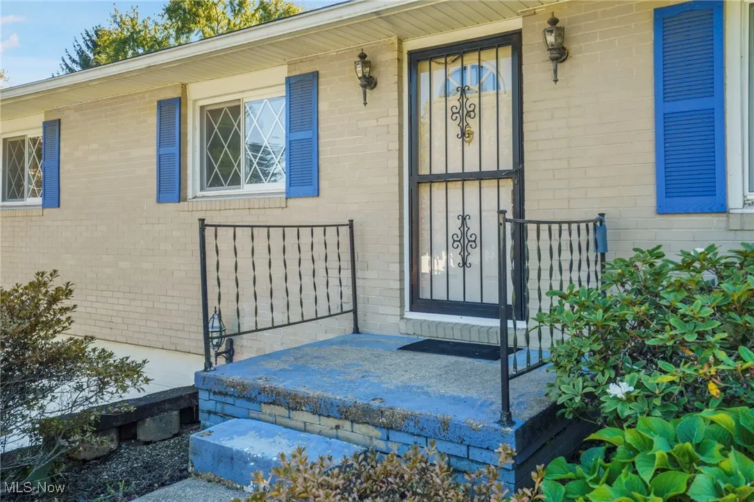 View of front entry with brick exterior