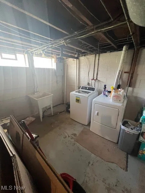 Basement featuring separate washer and dryer