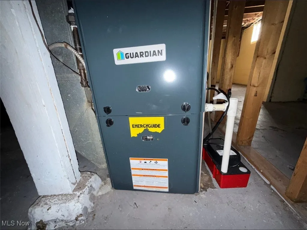 FH BSMNT Utility room featuring NEW FURNACE (2025)