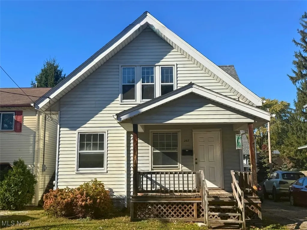 FRONT HOUSE (FH)-View of front of home featuring a porch