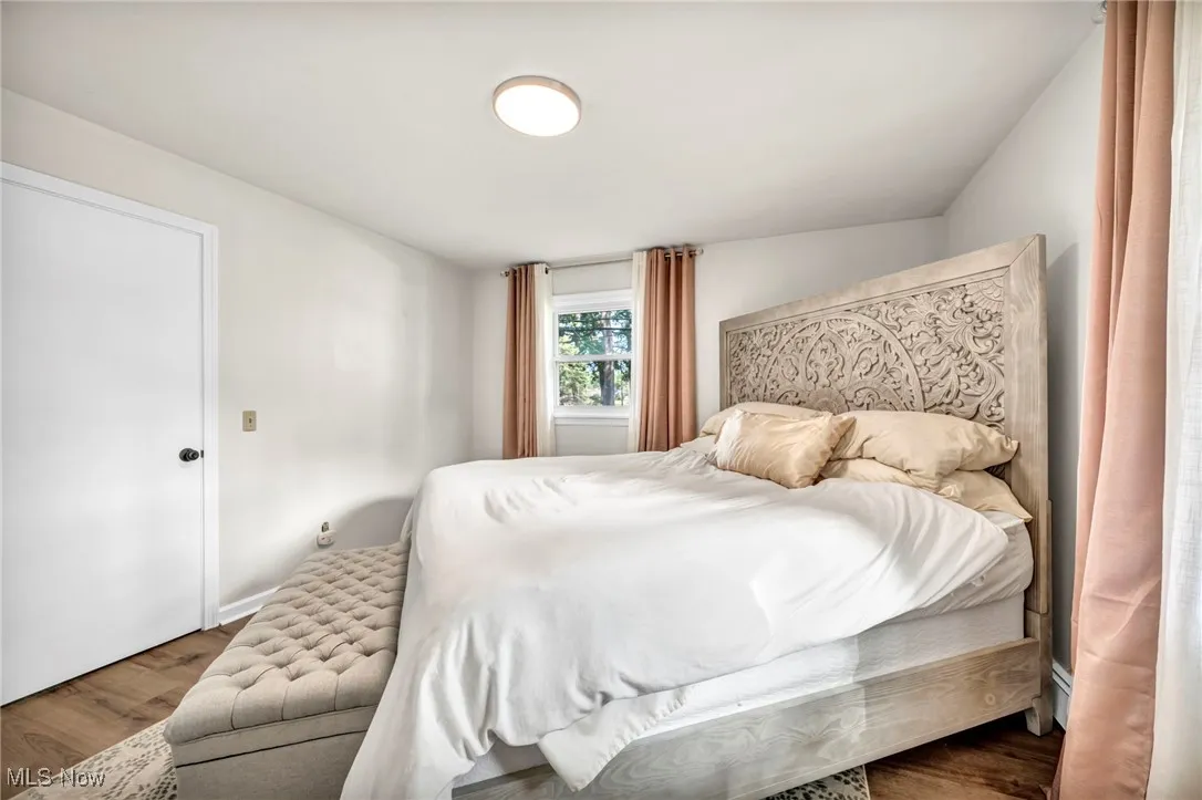 Bedroom featuring wood finished floors