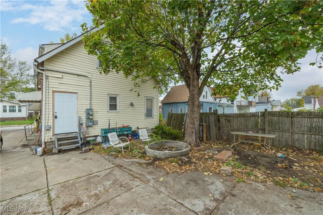 Rear view of house featuring entry steps