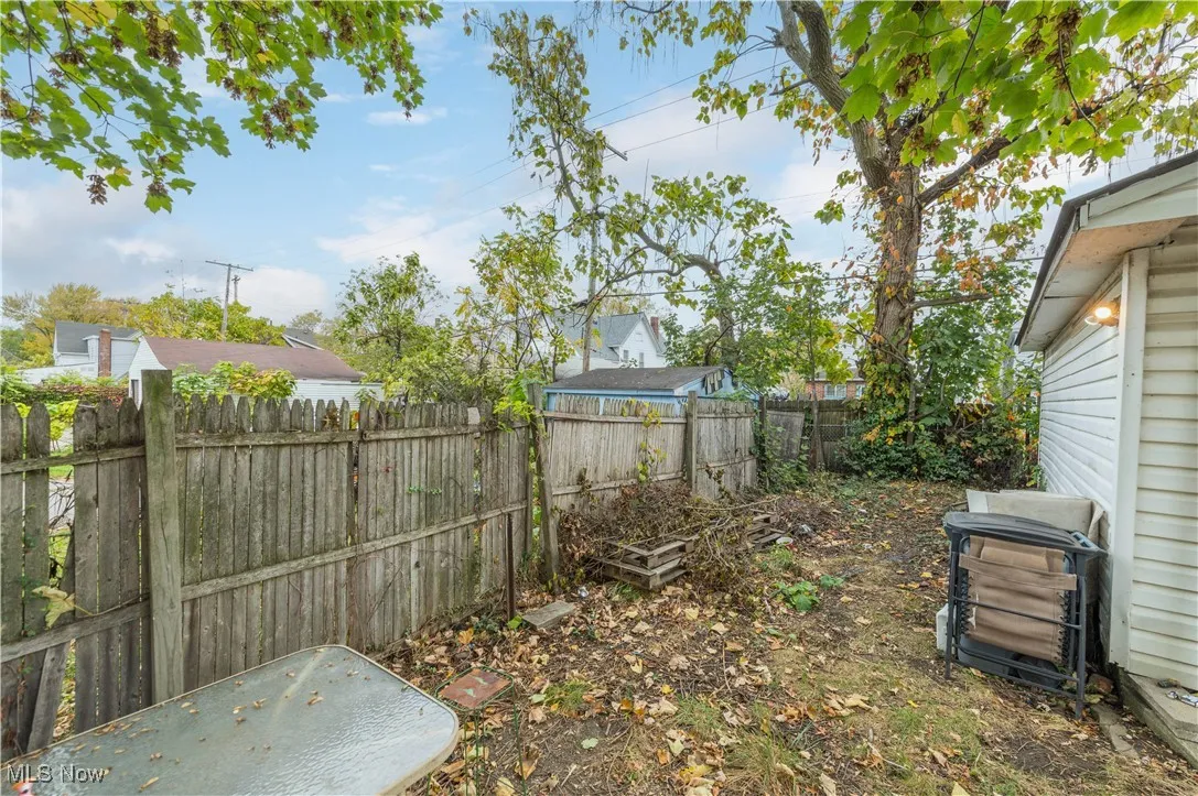 View of fenced backyard