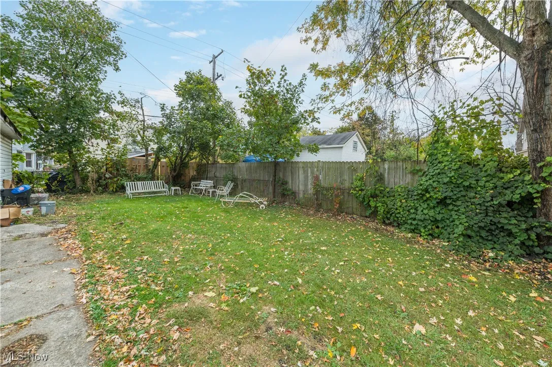 View of fenced backyard