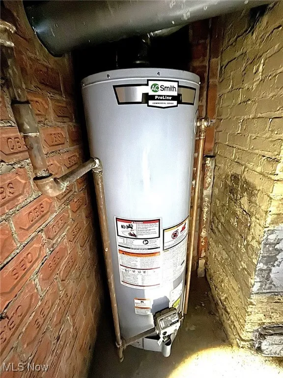 Utility room with gas water heater