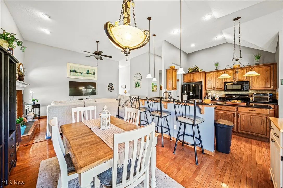 Open-concept living including dining space, living room, and kitchen