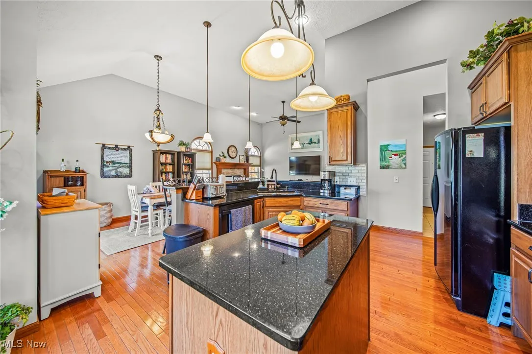 Beautiful black granite countertops and a spacious kitchen island