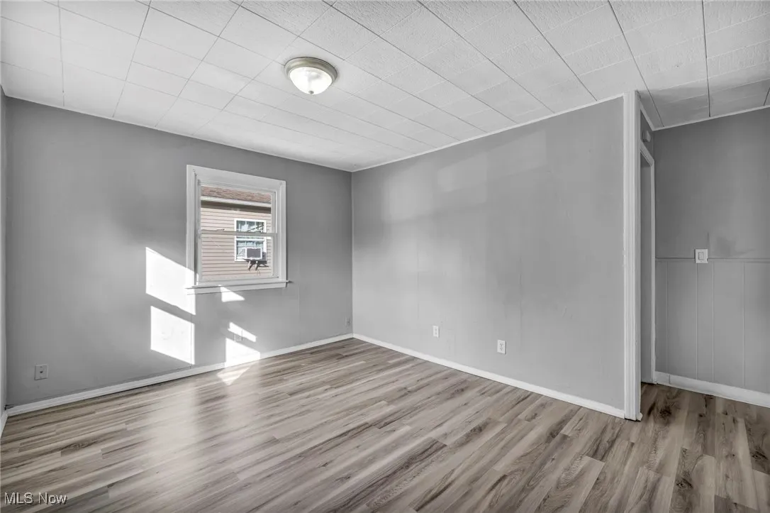 Spare room featuring light wood-style flooring