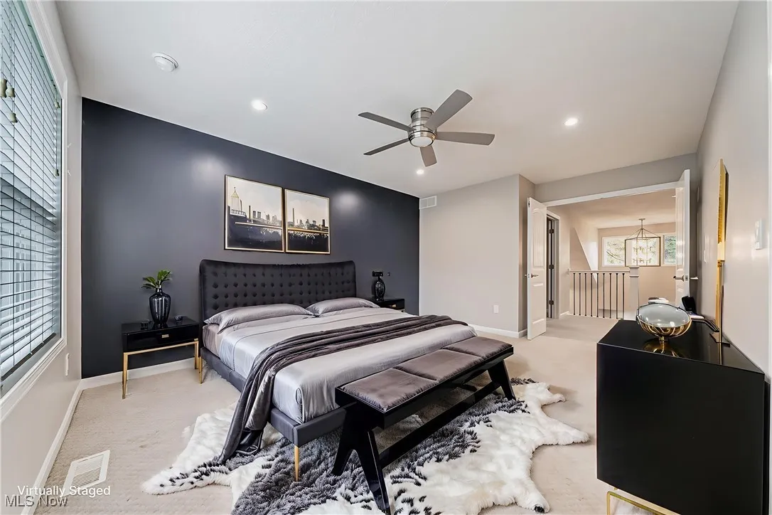 Virtually Staged-Primary Bedroom featuring light colored carpet, a ceiling fan, recessed light