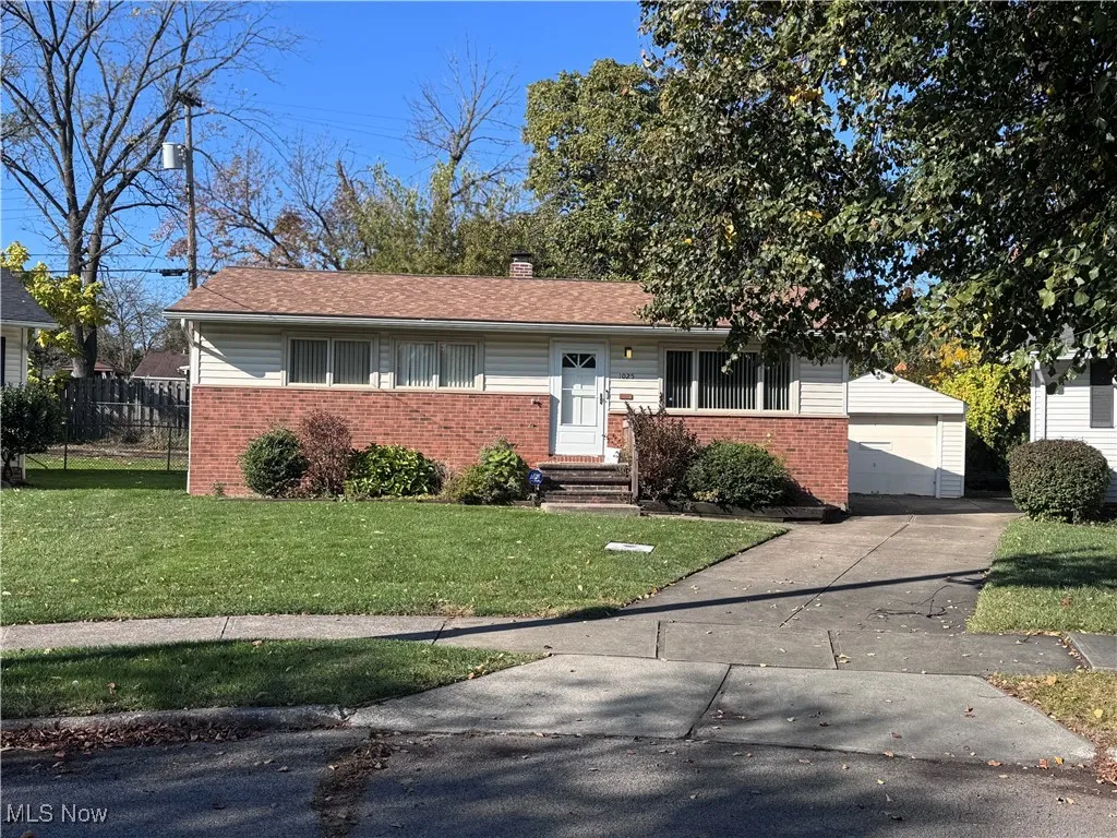 Ranch with brick belt and vinyl siding. 
Updated architectural shingled roof and concrete drive.