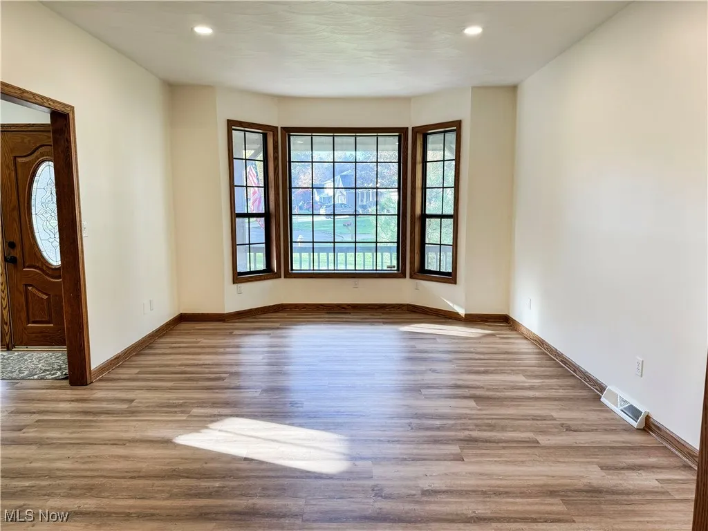 Foyer featuring light wood-style flooring and recessed lighting