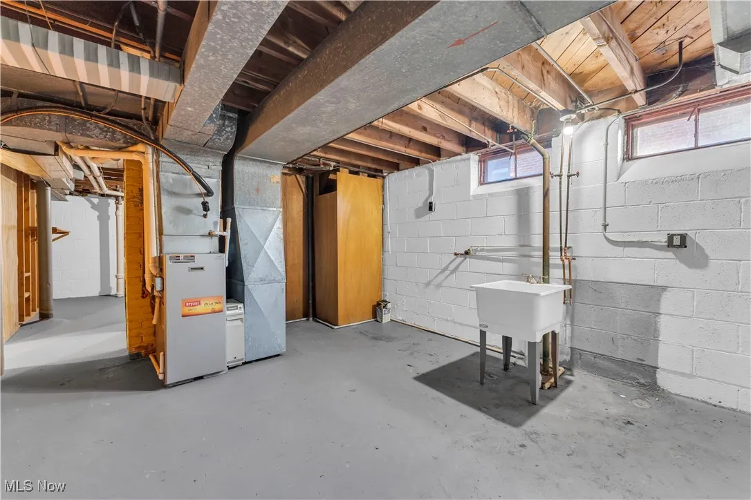 Below grade area with heating unit