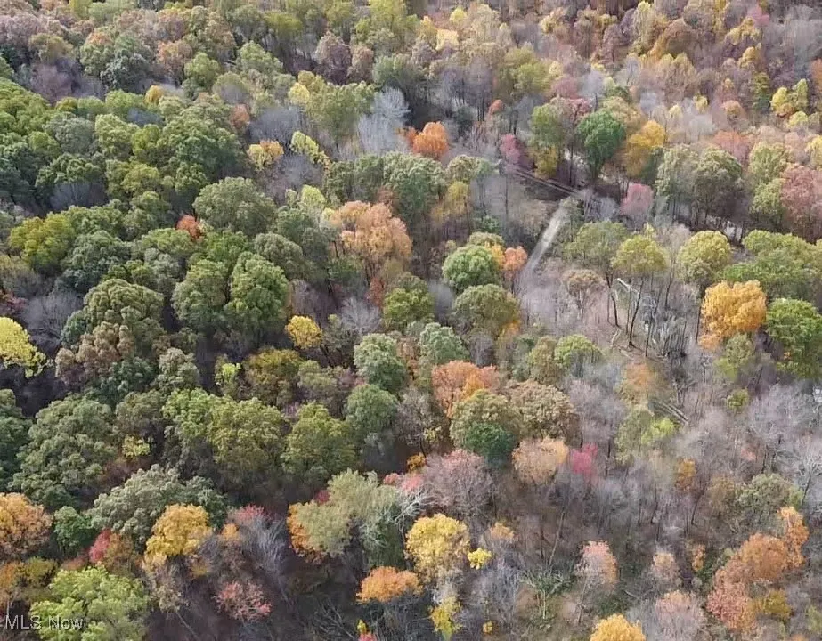 Aerial view of property driveway coming in off the road