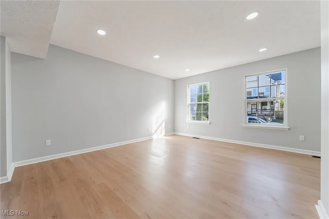 Unfurnished room featuring light wood-style flooring and recessed lighting