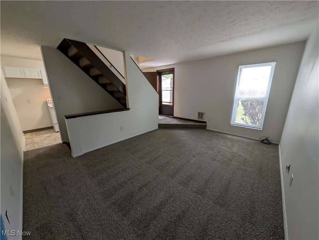 595 Dayton St Akron OH 44310 is a one bedroom townhouse in the North Hill area with a deck, storm door, basement, Living Room, Kitchen & entry on the 1st floor and the bedroom, bathroom and large oversized closet are on the 2nd floor. Recently replaced windows and siding  on the exterior and remodeled interior with new flooring, kitchen and bathroom. $750 per month plus electric by tenant. The landlord has provided trash pickup and off street parking lot. Property is just off Tallmadge Ave with easy access to Route 8.