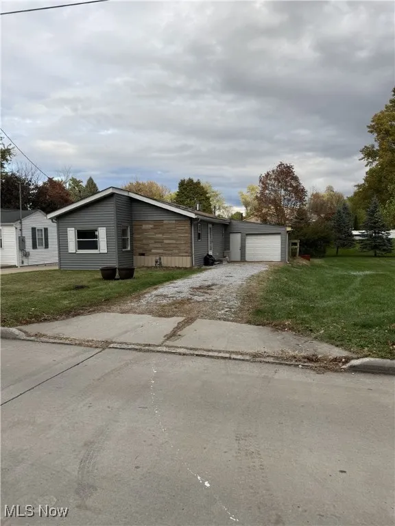 171 Marion Ave Mogadore, OH 44260 is a rare 3 bedroom rental in Mogadore. This home features an open living, kitchen and dining area set up perfectly for entertaining or family gatherings. All 3 bedrooms are on the same floor with the laundry room just behind double bifold doors in the kitchen. This home also sits on a double lot for plenty of fun outside.